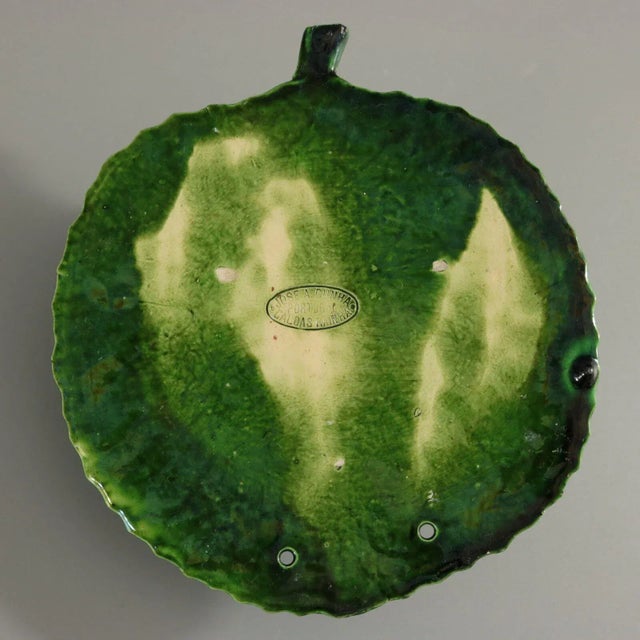 Jose A Cunha Portuguese Palissy Majolica wall pocket which features a crab on cabbage leaves. Colouration: green, pink,...