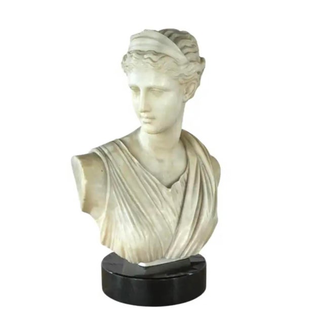 Italian Neoclassical Marble Bust of Diana, Goddess of the hunt, the moon, wild animals, and chastity. 19th Century, Italy...