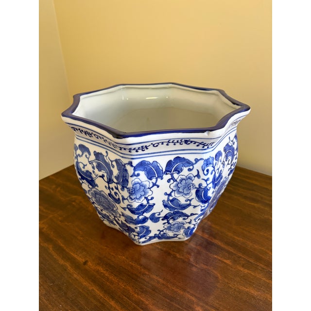 A stunning blue & white porcelain Chinoiserie planter or jardiniere China, 21st century Measures: 12.5"W x 12.5"D x...