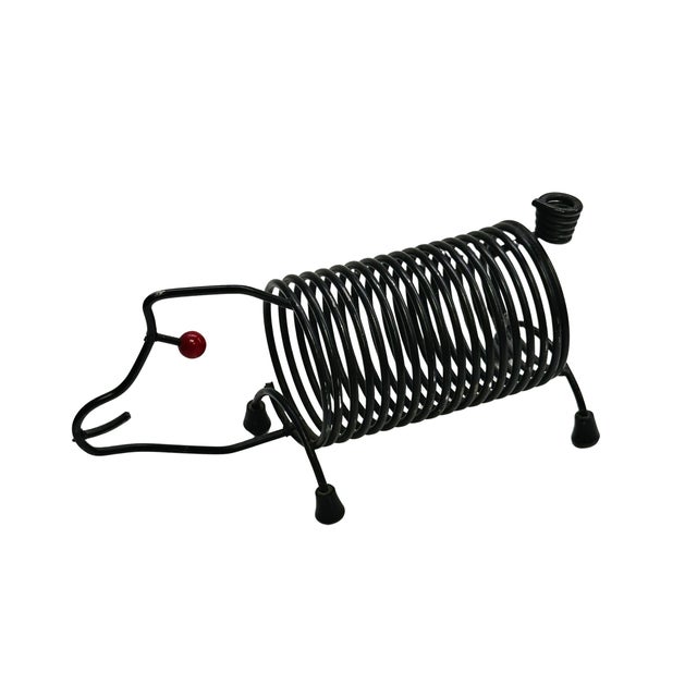 A playful vintage pig-shaped letter holder crafted from black-finished metal wire. Designed as both a functional desk...
