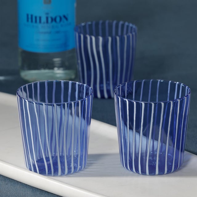 Marina Blue Stripe Glass Tumblers - Set Of Six The Marina Stripe Glass Tumblers feature a clean, modern design defined by...