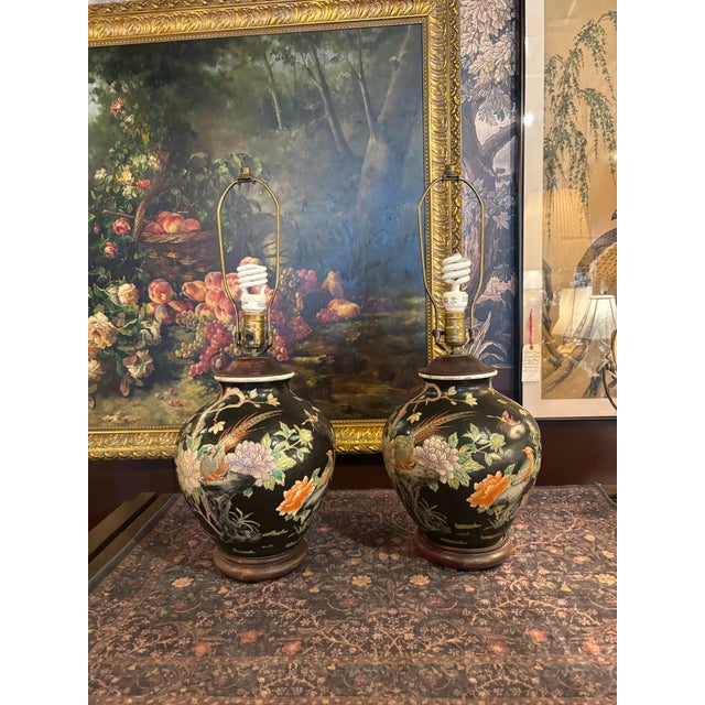 Beautiful pair of vintage Japanese hand-painted porcelain table lamps, dating approximately 1920–1950. Each lamp features...