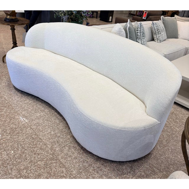 Soft, sculptural, and endlessly inviting, this brand new Bernhardt sofa channels the iconic curves of a Vladimir Kagan...