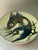 The Vintage Puigdemont Ceramic Wall Plate is a collector's item that adds an elegant touch to any home decor. Made of...