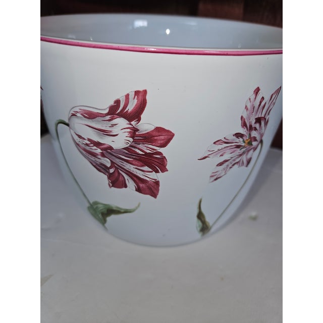 Charming Porcelain Cachepot made for the Metropolitan Museum of Art. Hand Painted tulips surround the piece.