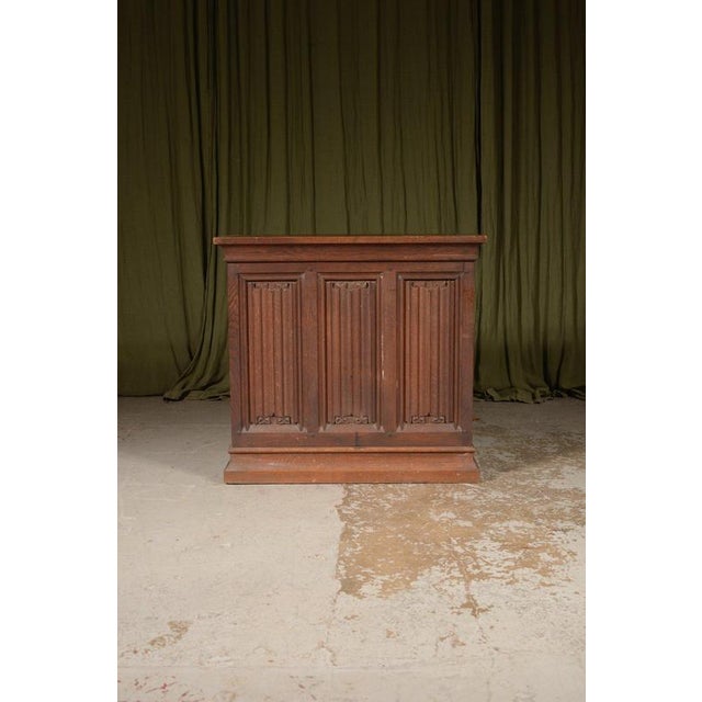 A beautifully carved and very useful Victorian oak console table, with incredible linenfold panelling. This piece is...