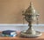 This large vintage Turkish brass Mangel is a striking decorative centerpiece featuring intricate hand-engraving and a...