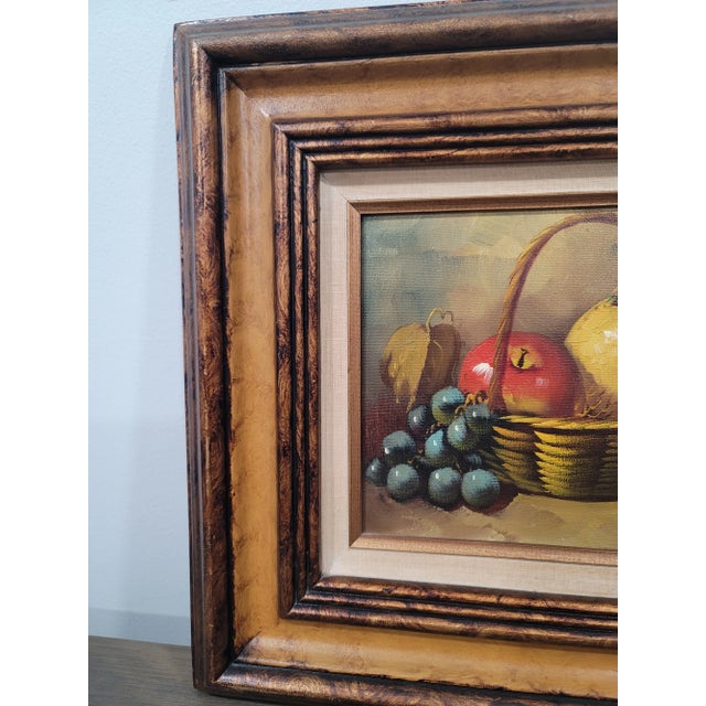 This beautiful painting by J. Remstedt is an original, small-sized work featuring red apples, grapes, and a pear. The...