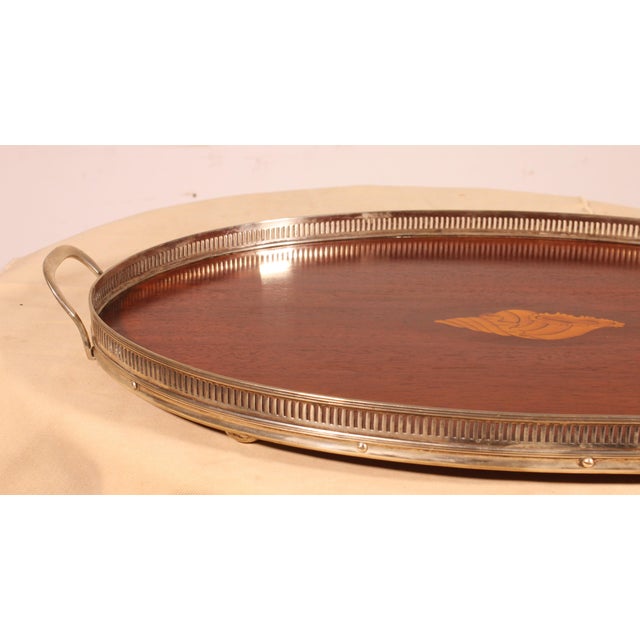 Lovely 19th-century English silver-plated and mahogany tray A beautiful large model with two handles, encircled by an...