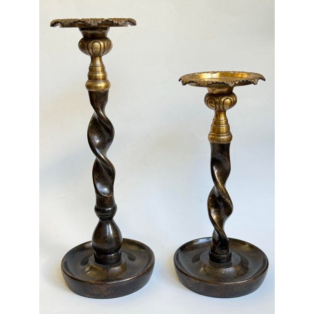 Pair of brass and bronze barley twist candle holders attributed tho Maitland-Smith. Late 20th century. Wonderful heft....