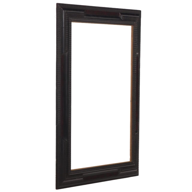 A sophisticated pair of Italian ebonized wood frames in the Dutch style, C. 1940, each distinguished by crisp 90-degree...