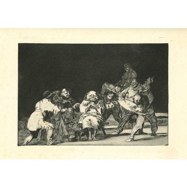 La lealtad - from Los Proverbios is an original black and white etching realized by Francisco Goya (1746-1828). The...