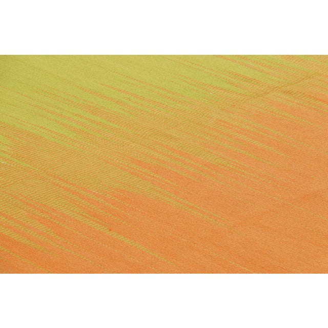 Handwoven in wool, this 6x9 Kilim is from an inventive new contemporary flat weave collection by Rug & Kilim. On the...