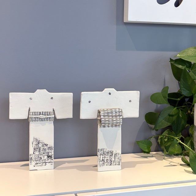 This one-of-a-kind composition of ceramic kimono sculptures is informed by Japanese kimono tradition interpreted in clay...