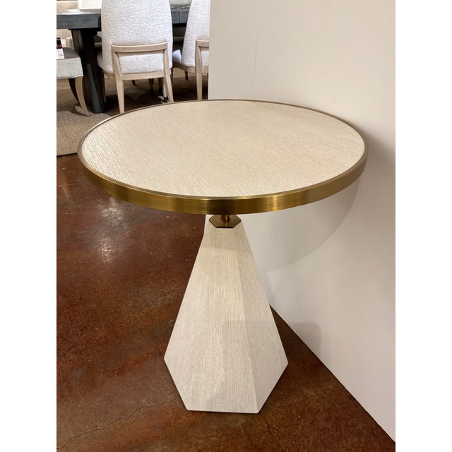 Styish Revelation Pylon Accent Table. Brass Trim, Off-White Wood body. Original Retail $1185. Showroom floor sample.