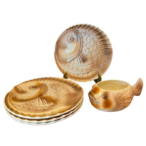 A gorgeous service of four fish-shaped majolica plates and sauce boat from the famous French company Sarreguemines. The...