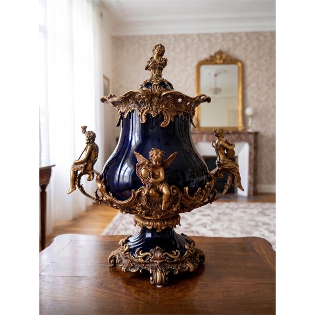 Large Covered Urn in Black Porcelain and Bronze Rocaille Decoration with Cherubs, 2010s, in Flawless conditions. Designed...