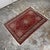 Design Plus Gallery presents a 3ft 7in × 5ft 4in Vintage Persian Area Rug from Iran. The rug has a red field with a...