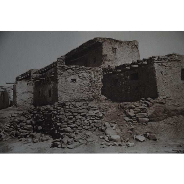 A crisp architectural study from the Southwest volumes of The North American Indian, this photogravure depicts the...