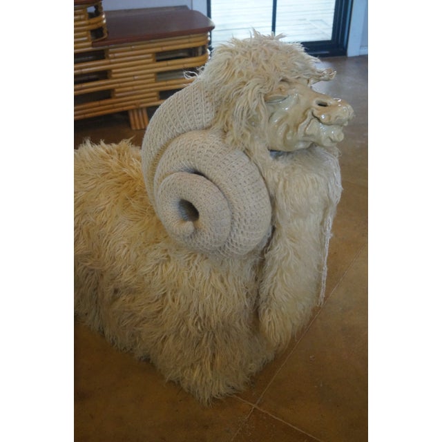 A wonderful original piece from the artist Edna Caltaldo, which is bench in the form of a big horn ram. The body is...