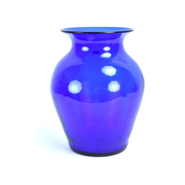 Brilliant and bright hand blown glass vase by Blenko. In a rich cobalt blue, ideal as a flower vase. Has the original...