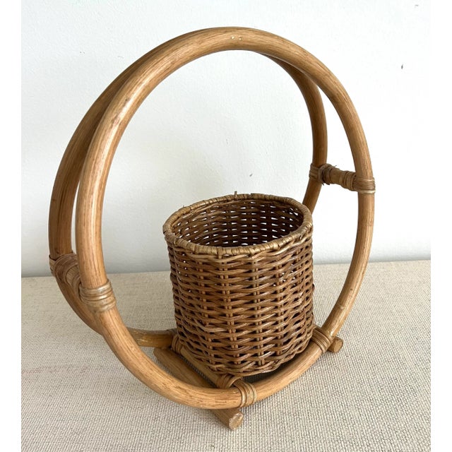 Vintage circular bamboo rattan planter with wicker. Looks great on table top. Wicker planter measures 5” x 5” x 5.5H”