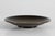 Small decorative Art Deco low bowl made of bronze. The brown patina mixes in with cobber green towards the center of the...