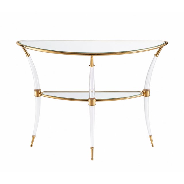 A sophisticated and exceptionally elegant vintage French console table in the style of Maison Charles, embodying the...