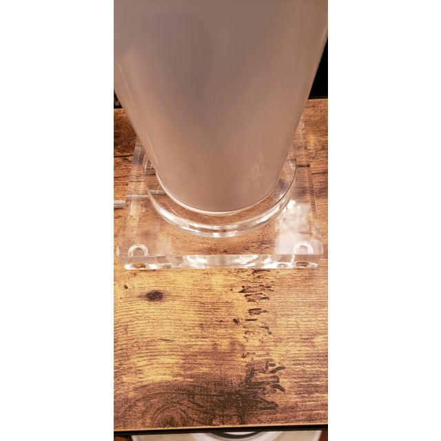 Beautiful green ceramic lamp with clear translucent base and top area near the bulb area. This is one of my favorites but...