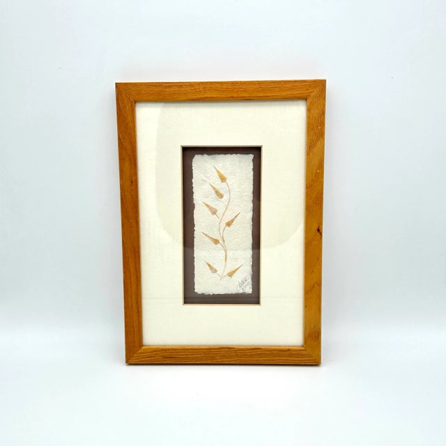 This vintage botanical collage art is a unique piece made by skilled African artisans. The beautiful artwork features a...