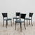 A stunning and captivating dining set of four original 1980s chairs, an excellent expression of postmodern design. This...