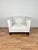 Pure form and simple elegance may best describe this supremely comfortable club chair. Deceptively “square," it envelops...