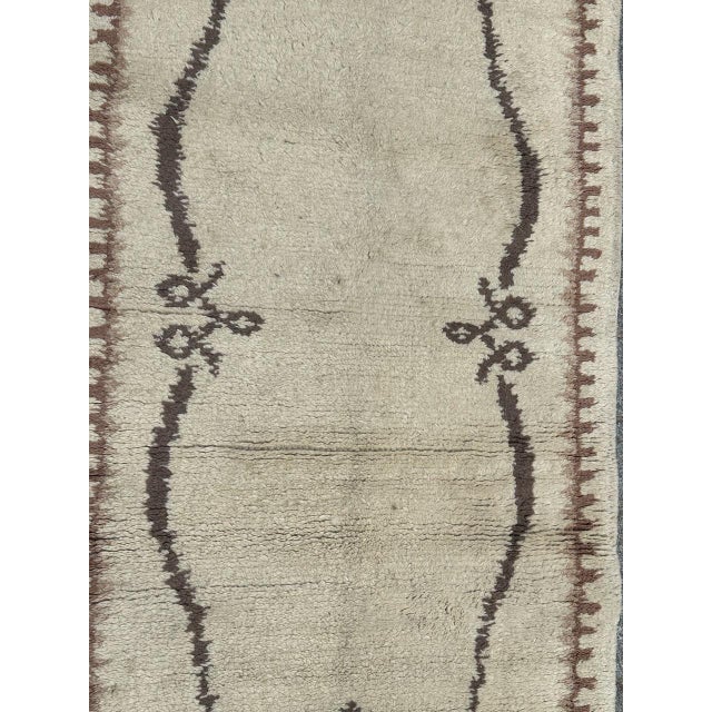 Nice mid 20th century Moroccan rug with a design of the French art deco rugs and nice colours with a white background and...