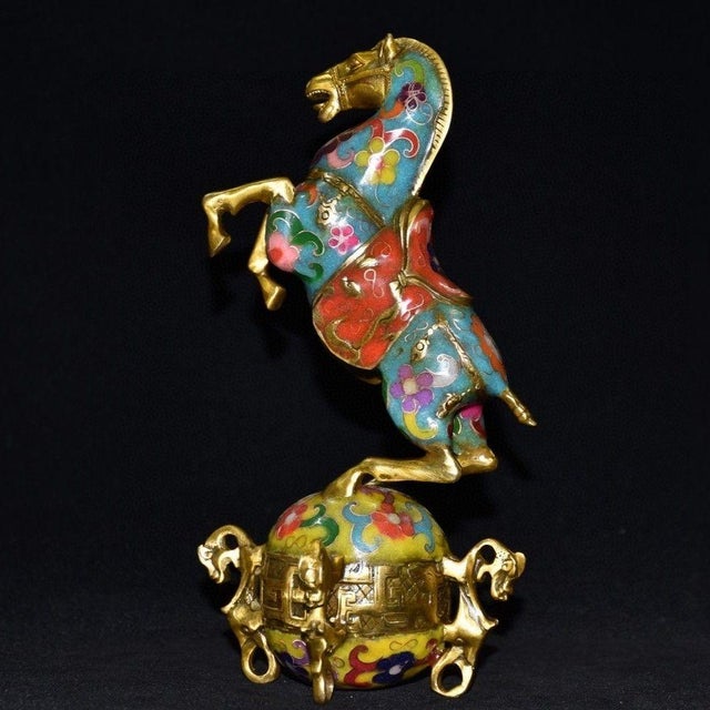 This is a vibrant vintage Chinese cloisonné enamel figure depicting a horse standing on a decorative sphere, a motif known...