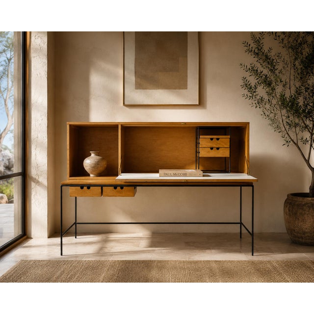 An iconic and highly architectural Paul McCobb “Planner Group” secretary desk for Winchendon Furniture, designed in the...