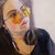 This oil on panel artwork captures a contemplative figure adorned with striking yellow sunglasses, evoking a sense of...