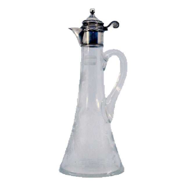 Glass Jug with Reliefs on the Neck and Silver Hinged Lid For Sale