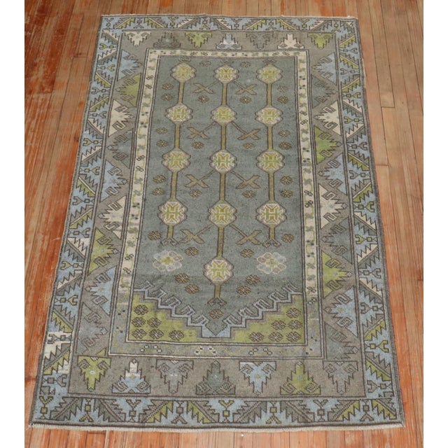 An accent size mid 20th Century Turkish Anatolian Rug in grays, blue, greens