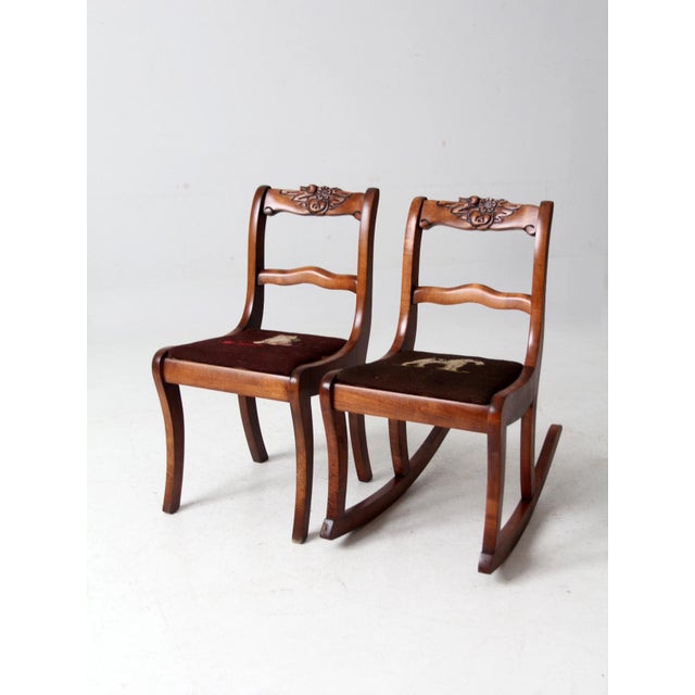 This charming pair of mid-century children’s chairs blends traditional revival styling with sweet needlepoint seats. One...