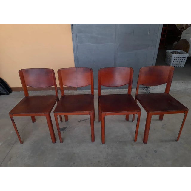 Set of four vintage chairs by Matteo Grassi, dark red leather. from Italy form 1990s period. Shows light scratches and...