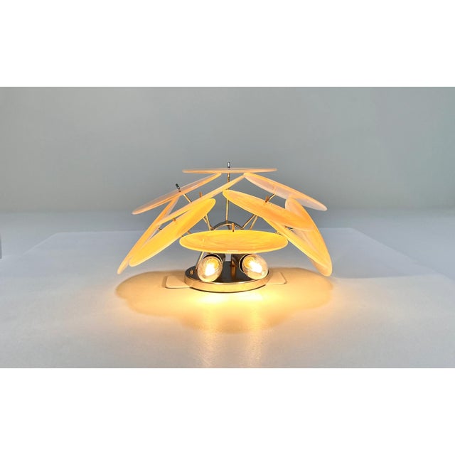 Pair of Vintage Italian Murano appliques in Vistosi style. Wall lights have 10 glass for each, iridescent alabaster honey...