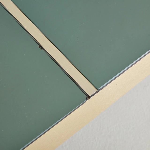 An Italian ‘Shilling’ square coffee table designed by Giovanni Ausenda, Guido Baldo Grossi & Gianni Gavioli for NY Form of...