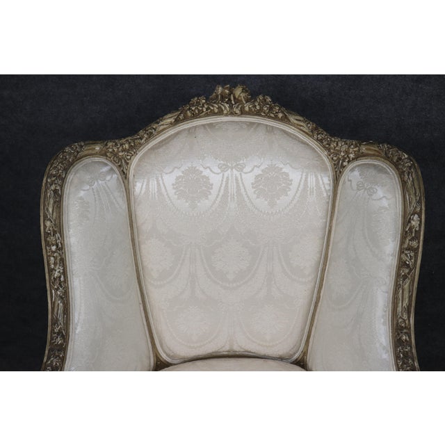 French French Louis XVI Creme Painted Tall Back Heavily Carved Bergere Chair For Sale - Image 3 of 12