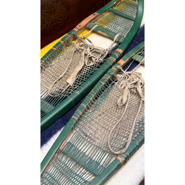 Antique Early 20th Century Cree Snowshoes With Babiche Lacing Green Paint For Sale - Image 4 of 11