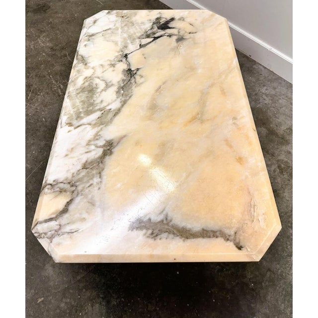 Width: 125 centimeters Height: 43 centimeters Depth: 76 centimeters Vintage marble coffee table in various tones of pinks,...