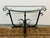 Design Plus Gallery presents a Wrought Iron Console Table.The design of the console is in the style of Tommy Bahama...