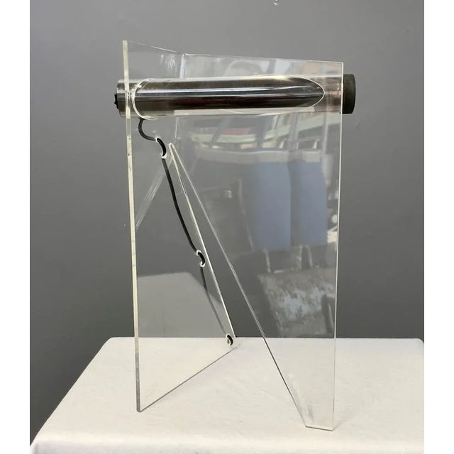 Rare metacrylate and acrylic glass table lamp. Designed and produced in Italy, it preserves the designer's signature....