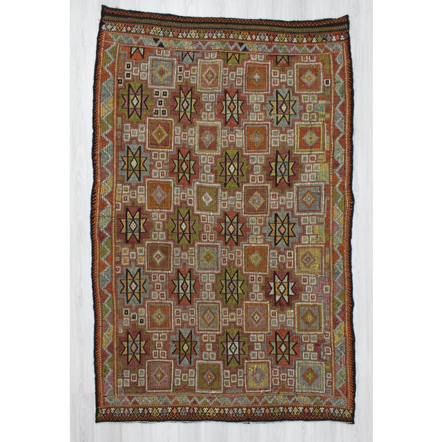 Handwoven vintage decorative embroidered kilim rug from Denizli region of Turkey. In very good condition. Approximately...