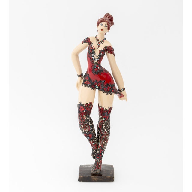 Josepha (French, b. 1950) Standing Woman Wearing a Red Dress Resin Sculpture, signed and numbered edition "21/30" to...