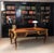 Large Louis XV style marquetry desk from the early 20th century. The top is edged with a gilt bronze molding with floral...